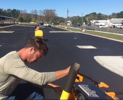 Compacting a New Surface of Asphalt NC Paving Pros